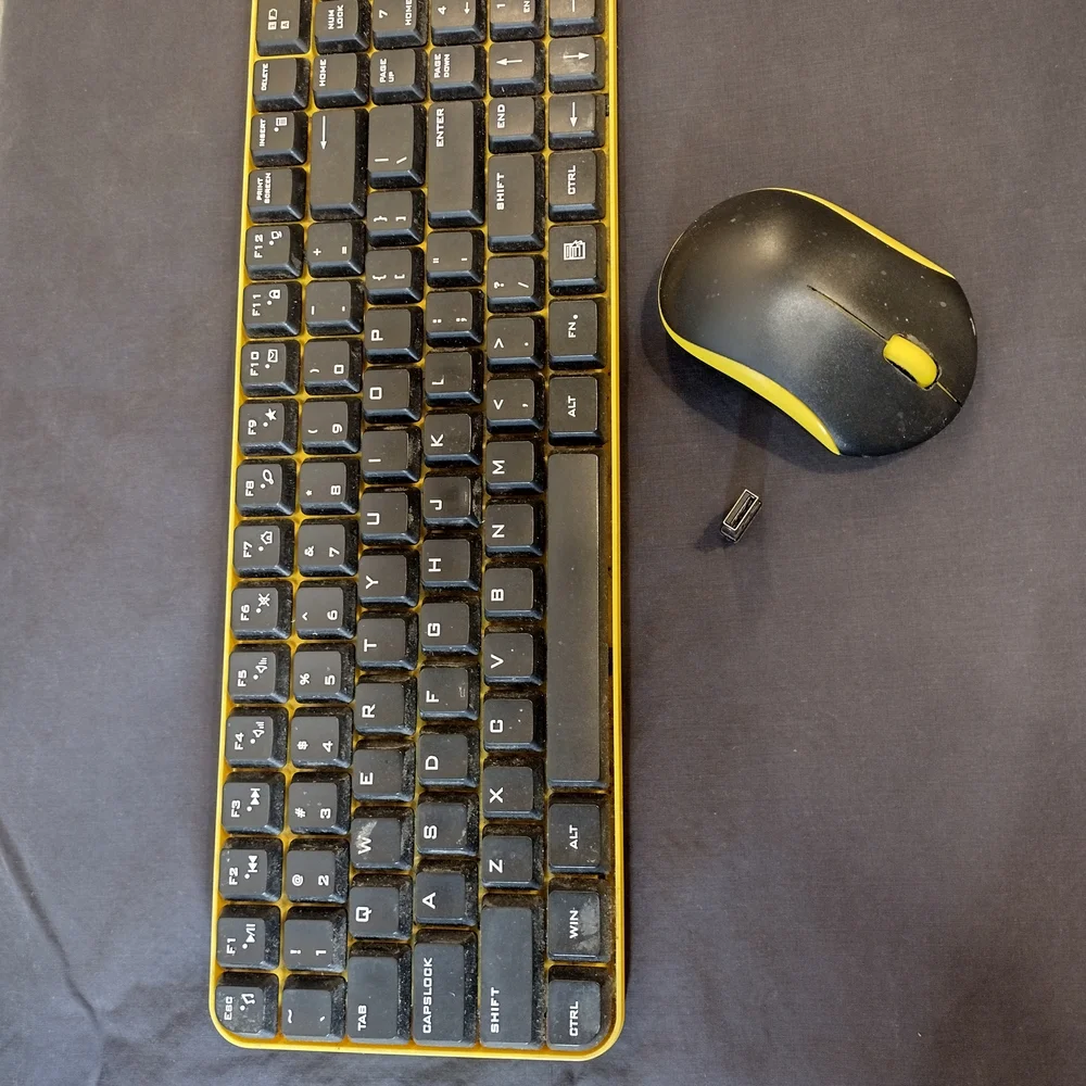 Logitech Black and Yellow Wireless Keyboard and Mouse Combo